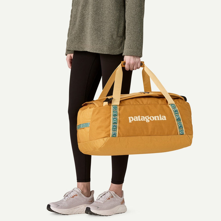 Patagonia Black Hole Duffel 40L - 100% postconsumer recycled polyester Pufferfish Gold Bags
