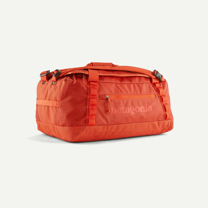 Black Hole Duffel 40L - 100% postconsumer recycled polyester Bags Patagonia Pollinator Orange