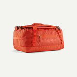 Black Hole Duffel 40L - 100% postconsumer recycled polyester Bags Patagonia Pollinator Orange