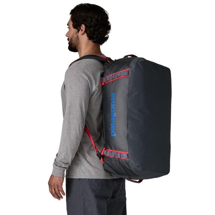 Patagonia Black Hole Duffel 55L - 100% postconsumer recycled polyester Smolder Blue w Amanita Red Bags