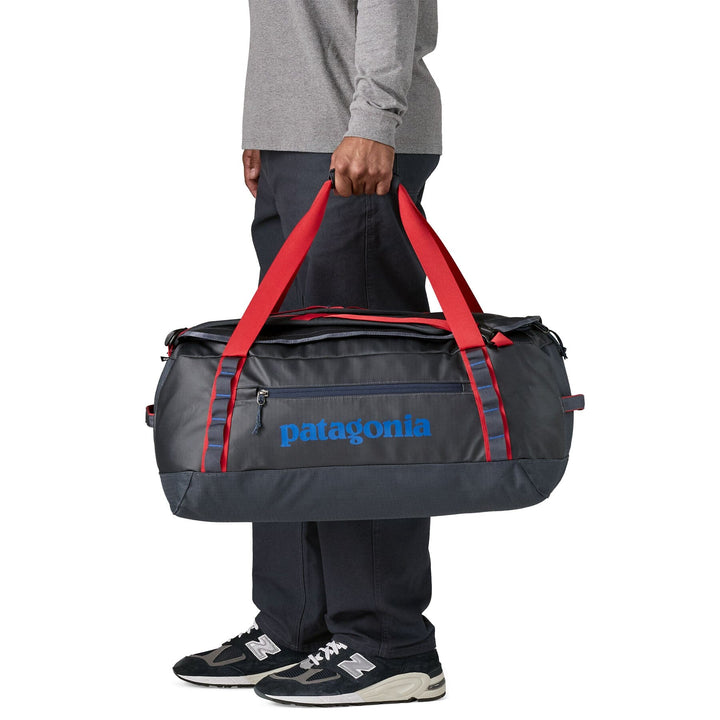 Patagonia Black Hole Duffel 55L - 100% postconsumer recycled polyester Smolder Blue w Amanita Red Bags