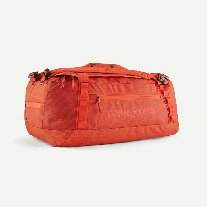 Patagonia Black Hole Duffel 55L - 100% postconsumer recycled polyester Pollinator Orange Bags