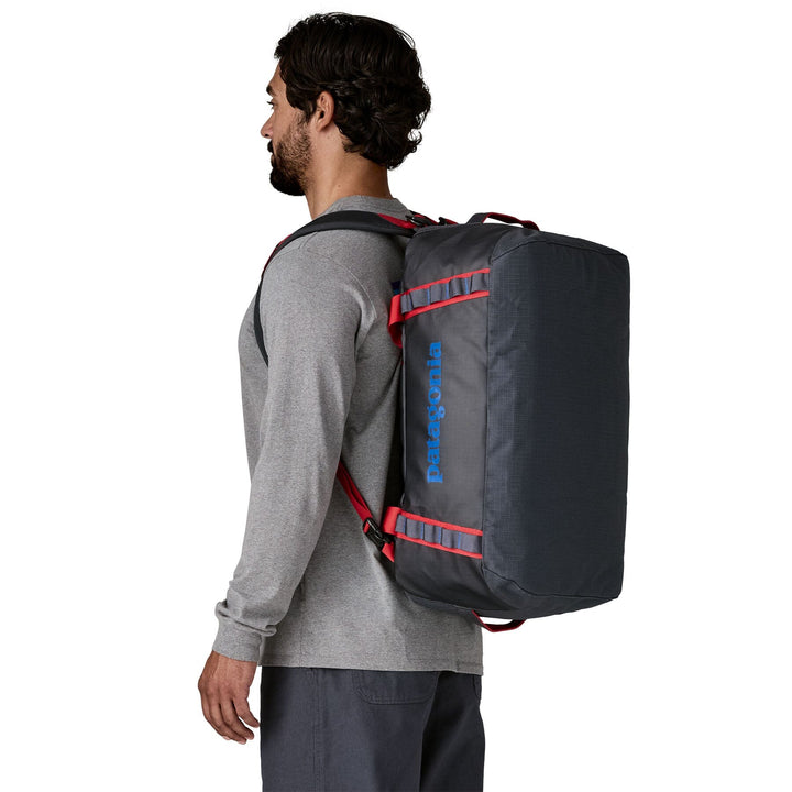 Patagonia Black Hole Duffel 70L - 100% postconsumer recycled polyester Smolder Blue w Amanita Red Bags