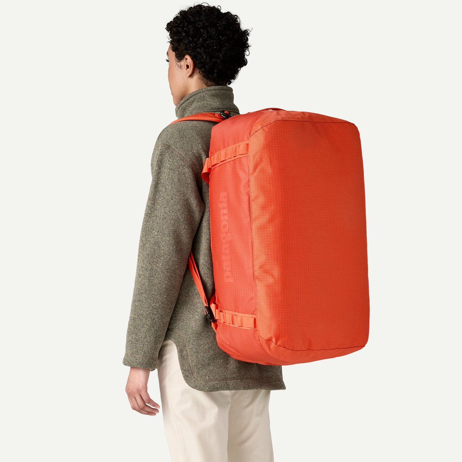Patagonia Black Hole Duffel 55L - 100% postconsumer recycled polyester Pollinator Orange Bags