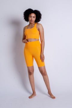 Girlfriend Collective Bike Shorts - Made from recycled plastic bottles Orange Zest Pants